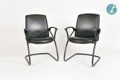 En provenance du siège de la Région Île-de-France Pair of black leather armchairs,

Brand...