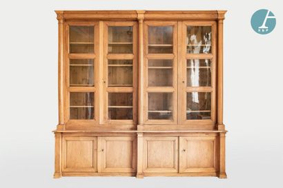 En provenance du siège de la Région Île-de-France Two-body bookcase in natural wood,...