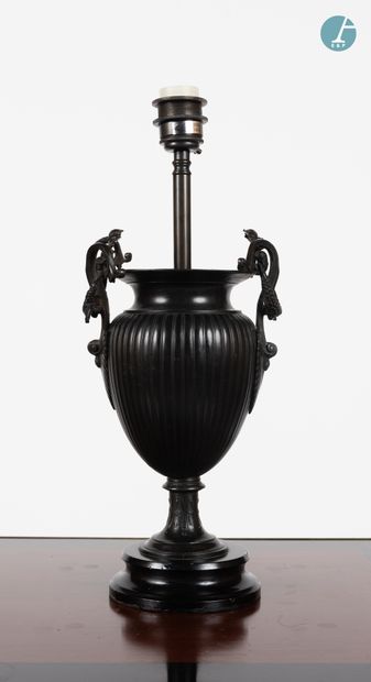 null 
Set comprising a pair of black patinated bronze lamp bases in the shape of...