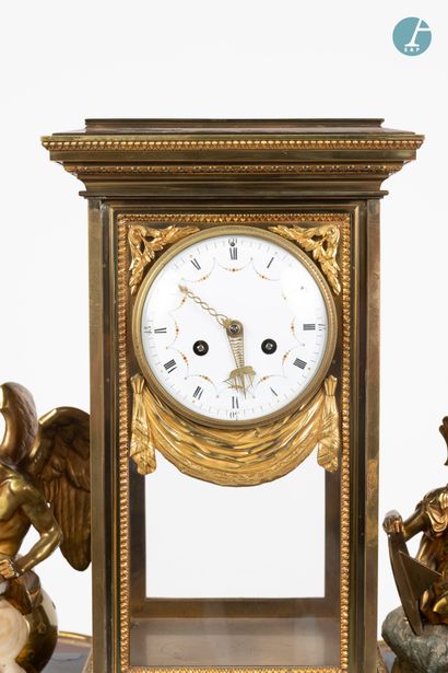null 
From a prestigious Parisian Palace 


Clock in gilt bronze and grey marble...