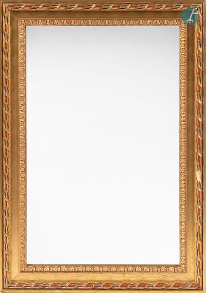 null 
From a prestigious Parisian Palace 


Two mirrors in carved and gilded moulded...