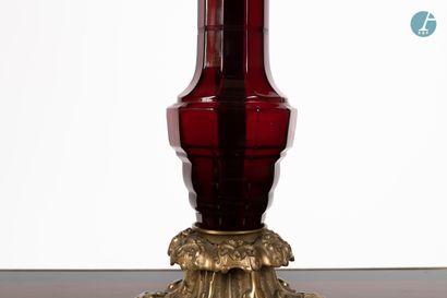 null 
From a prestigious Parisian Palace 


Gilt bronze lamp with a baluster shaft...
