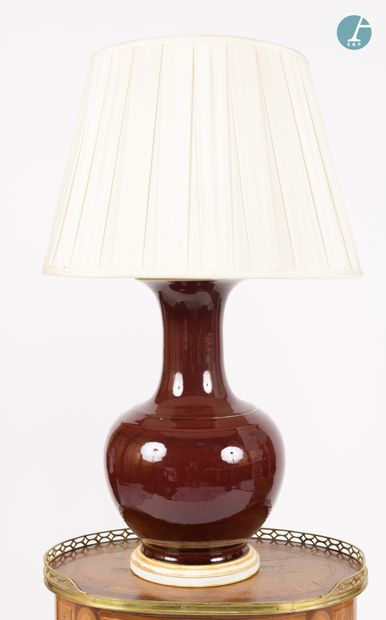 null 
From a prestigious Parisian Palace 


Two vases mounted in lamps, oxblood red...