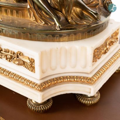 null 
From a prestigious Parisian Palace 


Gilt bronze clock and white marble base,...
