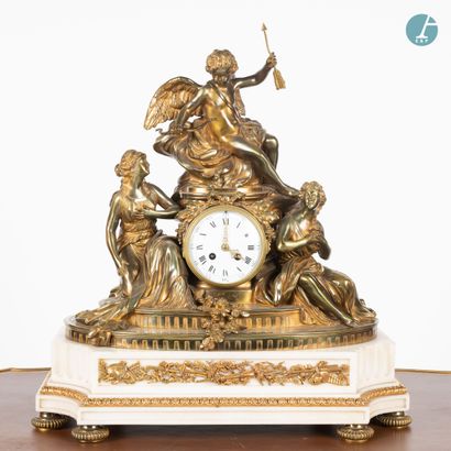 null 
From a prestigious Parisian Palace 


Gilt bronze clock and white marble base,...