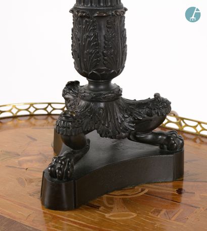 null 
From a prestigious Parisian Palace 


Bronze lamp base with black patina, the...