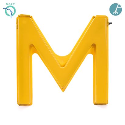  M in yellow plastic, backlit by neon. Circa 1960/1980 
H : 72cm - W : 74cm - D :...