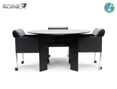null Set including a circular meeting table, black slate style top, grooved and black...