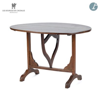 null From the Sources de Caudalie
Gate-leg table in natural wood, oval top.
The mechanism...