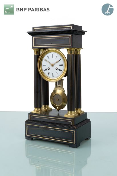 null Portico clock in blackened wood and nets; (accidents and misses).
Second half...