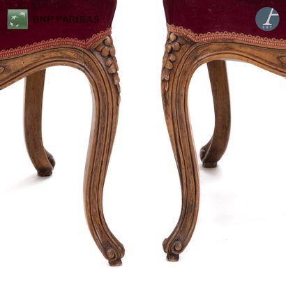 null Suite of three chairs in natural wood molded and carved. The upholstery of burgundy...