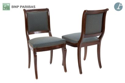null Pair of chairs in molded and carved mahogany. The upholstery in royal blue fabric...