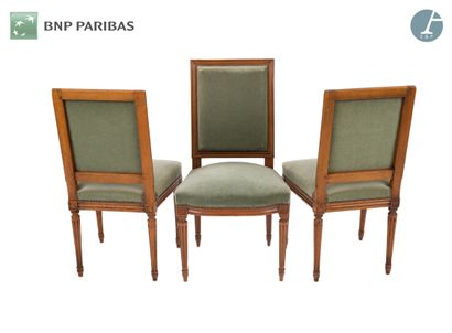 null Suite of three chairs in natural wood molded and carved. The upholstery of green...