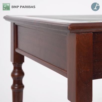 null Rectangular desk in molded and carved mahogany, opening with two drawers in...