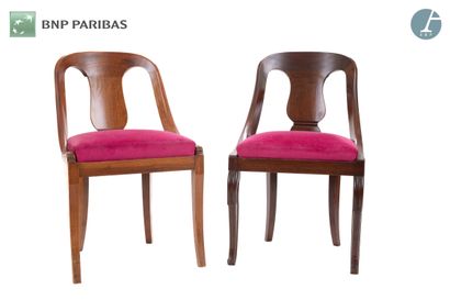 null Series of four gondola chairs in molded and carved mahogany. The seat in burgundy...