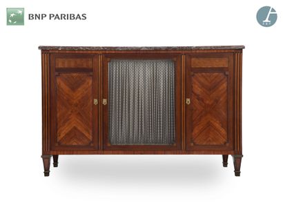 null Low piece of furniture in natural wood and veneer decorated with
Marquetry of...
