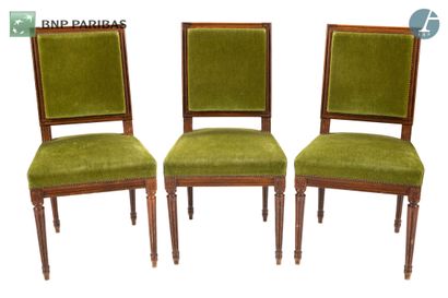 Suite of three chairs in natural wood molded...