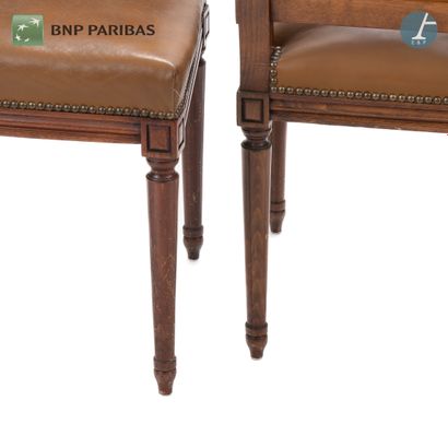 null Pair of chairs in natural wood molded and carved stained mahogany. The upholstery...