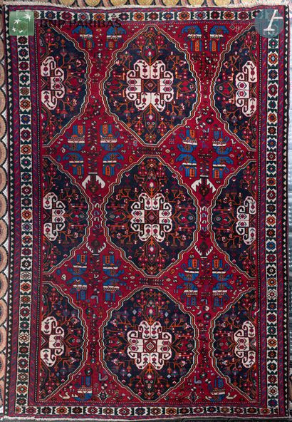 null AFCHAR (IRAN) - 20th century
Wool carpet, cotton warps and wefts
Decorated with...