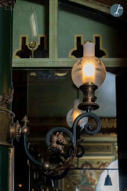 null From the Maison Ladurée - Entrance hall. 

Set of four chased bronze and black...