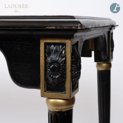 null From the House of Ladurée - Chocolaterie

A large table in molded and carved...