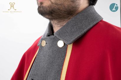 null From the Metropole Hotel (Brussels):
Grey wool and cashmere valet coat, red...