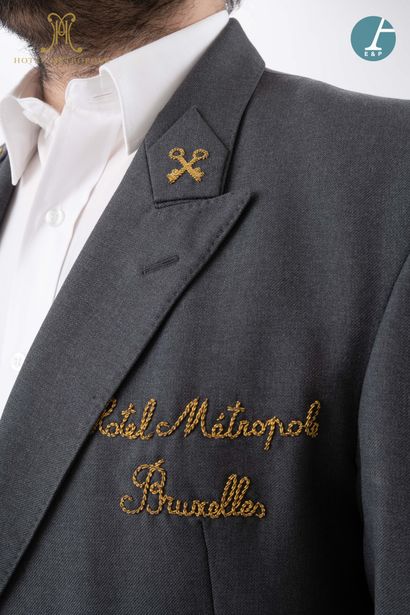 null From the Hotel Metropole (Brussels):
Gray janitor's frock coat, embroidered...