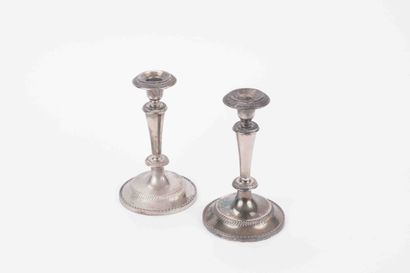null From the Hôtel Métropole (Brussels) : 
Pair of silver-plated metal candlesticks,...