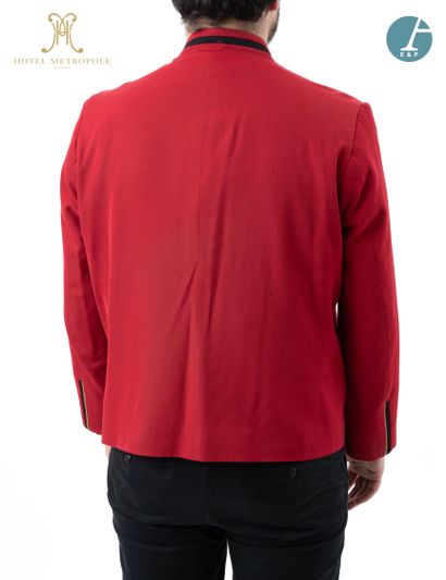null From the Hotel Metropole (Brussels): 
Red bellboy jacket, black braid, gold...