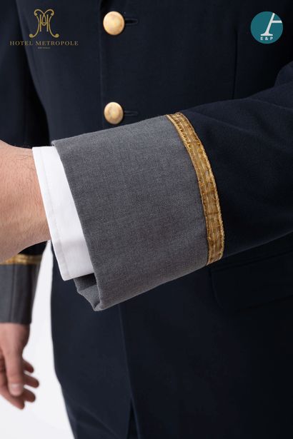 null From the Hotel Metropole (Brussels): 
Black and gray valet jacket, gold embroidered...