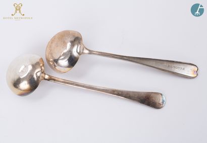 null From the Hotel Métropole (Brussels): 
Set of two silver plated ladles (dented...