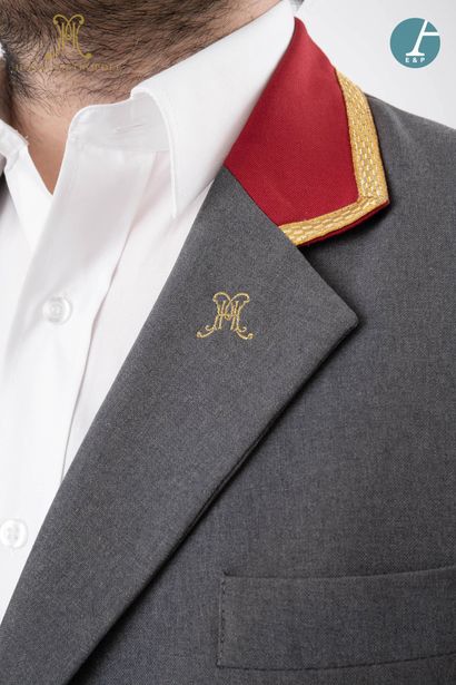 null From the Hotel Metropole (Brussels): 
Grey and red valet jacket, gold embroidered...