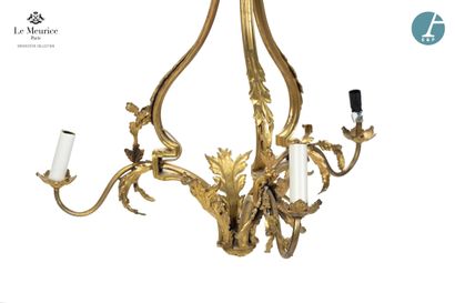 null From the Hôtel Le Meurice.
Chased and gilded bronze chandelier, stylized petals...