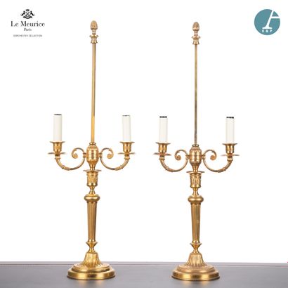 null From Hôtel Le Meurice.
Pair of chased and gilded bronze lamp bases, with two...