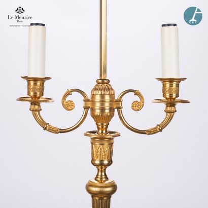 null From Hôtel Le Meurice.
Pair of chased and gilded bronze lamp bases, with two...