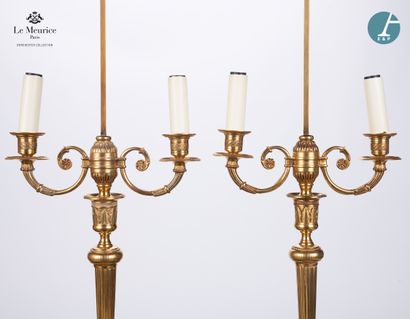 null From Hôtel Le Meurice.
Set of four ormolu lampstands, with two scrolled light...