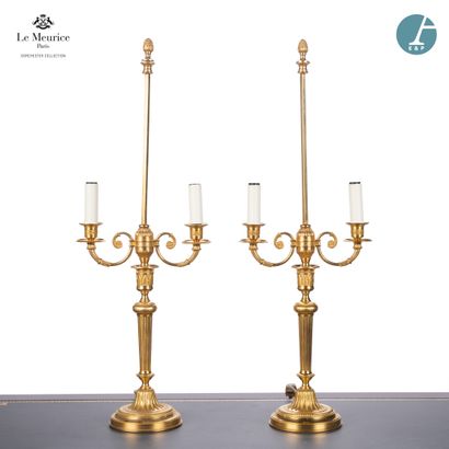 null From Hôtel Le Meurice.
Pair of chased and gilded bronze lamp bases, with two...