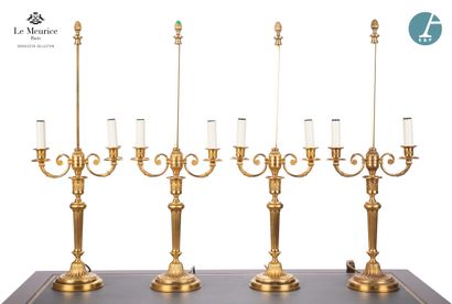 null From Hôtel Le Meurice.
Set of four ormolu lampstands, with two scrolled light...