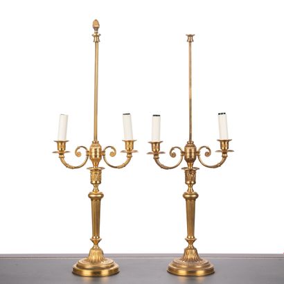 null From Hôtel Le Meurice.
Set of five ormolu lampstands, with two scrolled light...