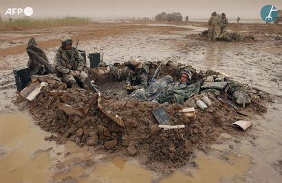 AFP - Eric Feferberg
Marines américains dans...