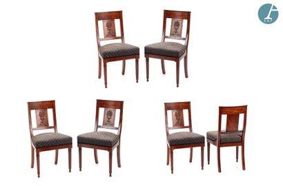 null Six mahogany and mahogany veneer chairs, openwork back with a central crosspiece...