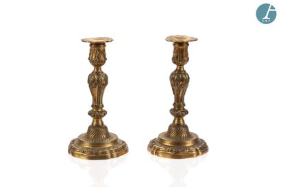 null Pair of gilt brass candlesticks with rocaille decoration. 
Louis XV style.
H...