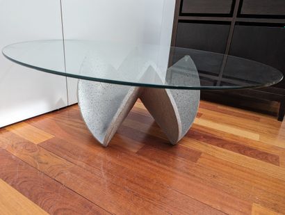 null Brutalist glass table, grey cement base, sand rose shape, circular glass top.
H:...