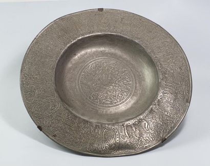 null Pewter quest plate with frieze decoration of many characters costumes depicting...