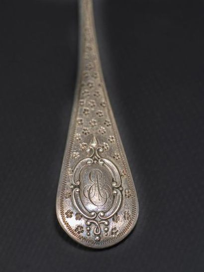 null Silver SAUPOUDREUSE with chiselled decoration of flowers and monogrammed medallion,...