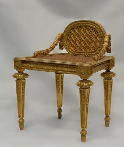 null Harpist's or musician's chair in wood and gilded stucco with wide cane seat...