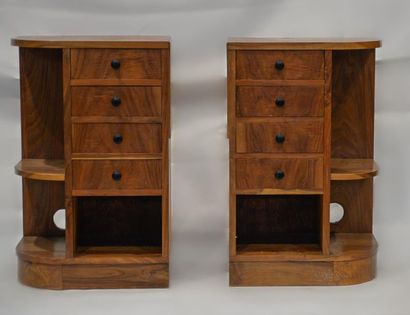 null Pair of natural wood BEDS with a rounded corner, opening by four drawers on...