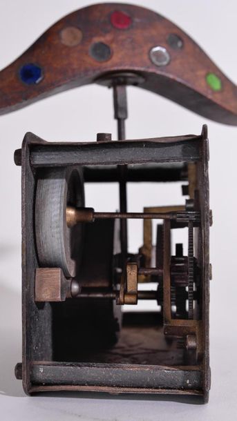 null ALLOWER MIRROR with wooden aliform and small mirrors, animated by a mechanism....