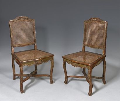 null PAIR OF CHAIRS in natural wood formerly lacquered green, with cane back and...