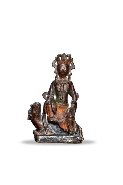 null CHINE - Epoque MING (1368 - 1644)

Statuette de Manjusri en bronze à patine...